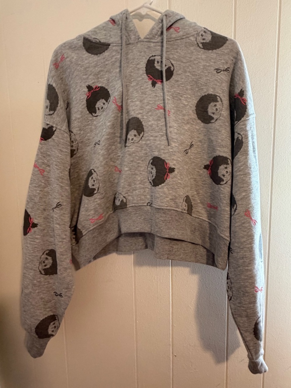 Gray Hoodie with Cute Face Print and Pink Bow Accents